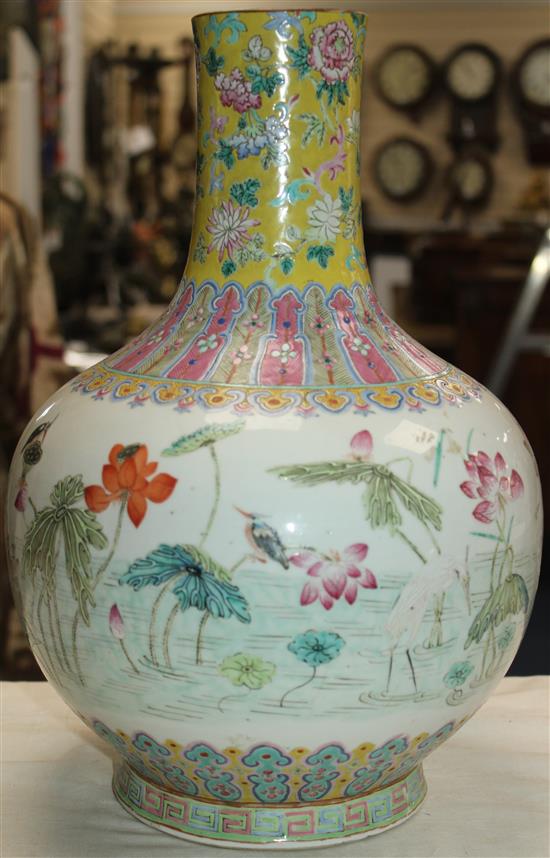 A Chinese famille rose bottle vase, Daoguang seal mark and of the period (1821-50), 36cm, neck reduced, base drilled